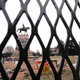An 8-foot fence is erected around the Robert E. Lee monument on January 25, 2021 in Richmond, Virginia. The State Department of General Services in Richmond installed the fence to ensure the safety of visitors and workers as they prepare the site for the removal of the statue.